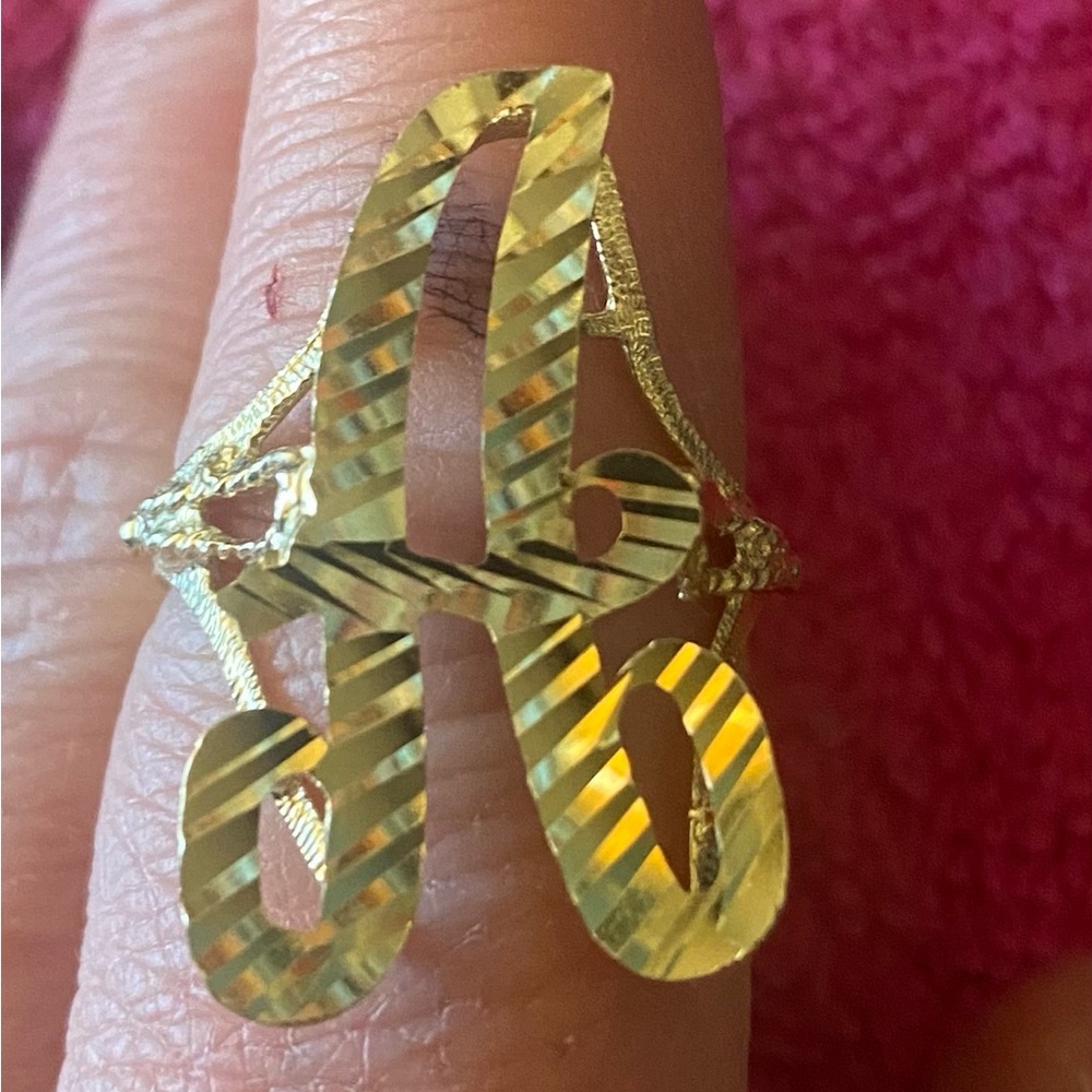 14 k solid gold A ring